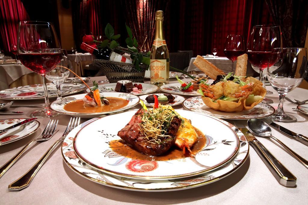 Nice Prince Hotel Chiayi City Exterior photo A dinner table set for fine dining
