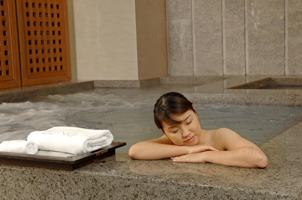 Nice Prince Hotel Chiayi City Exterior photo A woman relaxing in a spa